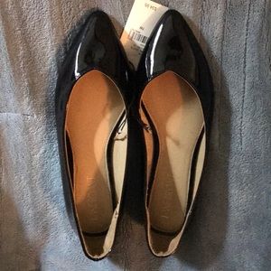 LB SZ 7W Black Patent. Never worn.